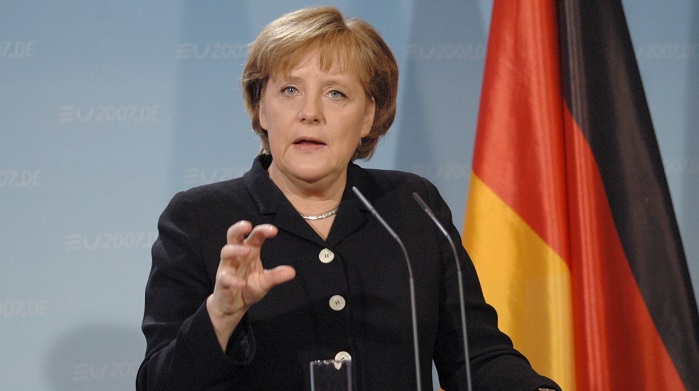 Angela Merkel under attack to put the world before Germany